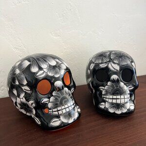 Pair vintage Mexican black white ceramic Luminaria Skulls dia de los muertos